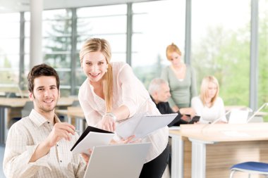 Student businesspeople having meeting in office clipart