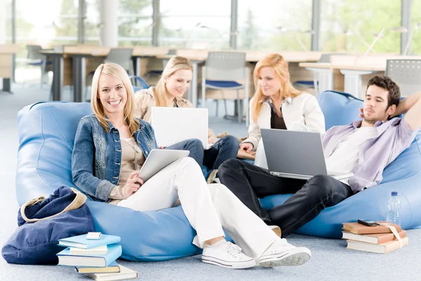 Group of young students at high school Royalty Free Stock Images