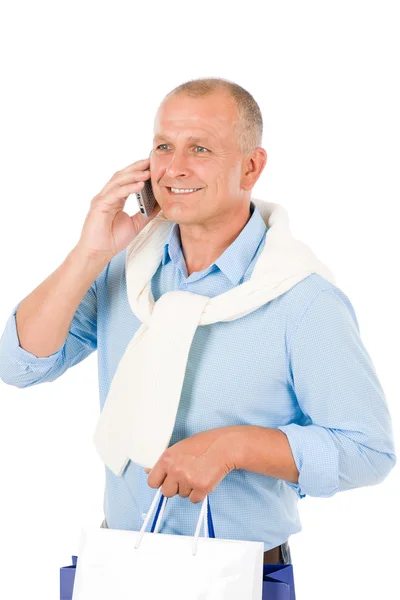 Senior glücklicher Mann mit Einkaufstüten — Stockfoto