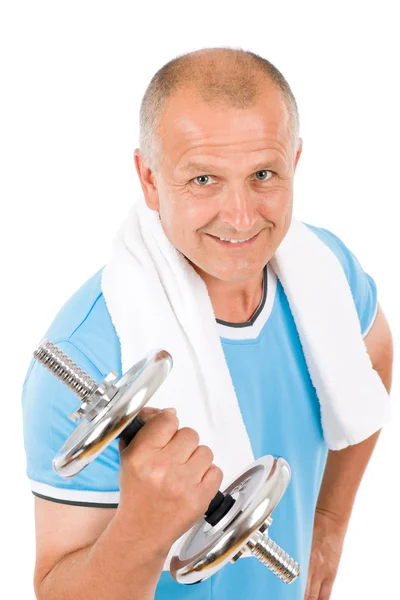 Feliz hombre maduro haciendo ejercicio con pesas —  Fotos de Stock