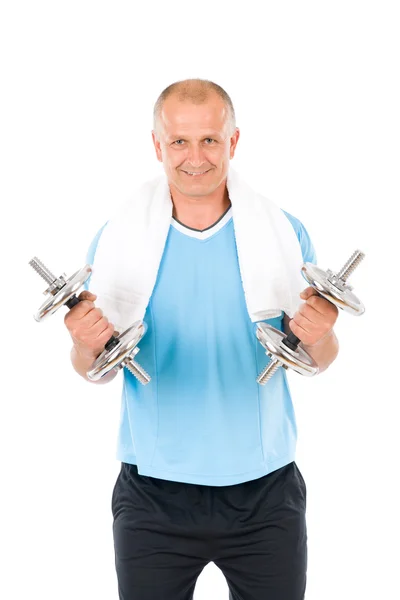 Feliz hombre maduro haciendo ejercicio con pesas —  Fotos de Stock