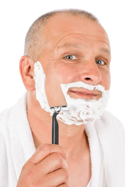 Manliga kosmetika - mogen man rakar skägget — Stockfoto
