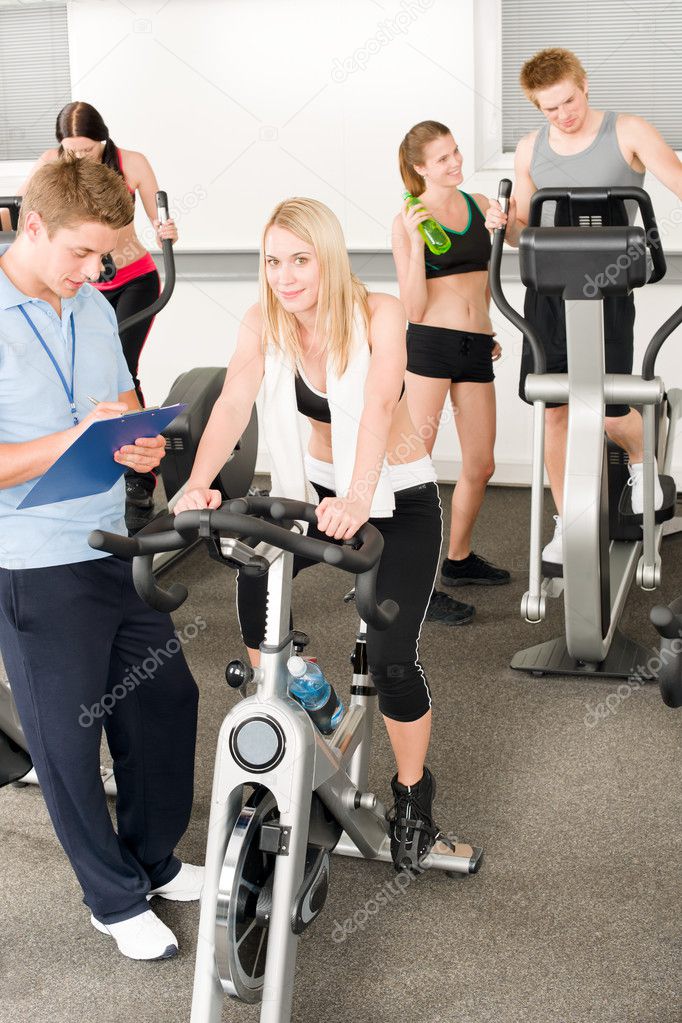 Fitness young girls at gym with instructor