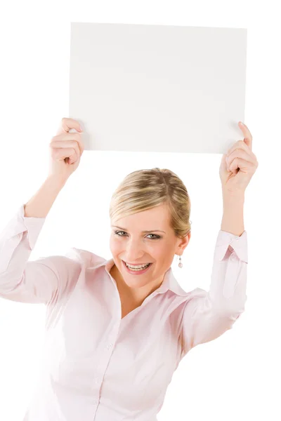 Happy businesswoman hold up empty banner — Stock Photo, Image