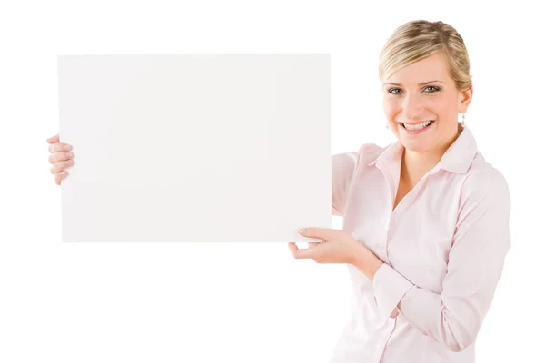 Glückliche Geschäftsfrau hält leeres Transparent zur Seite — Stockfoto