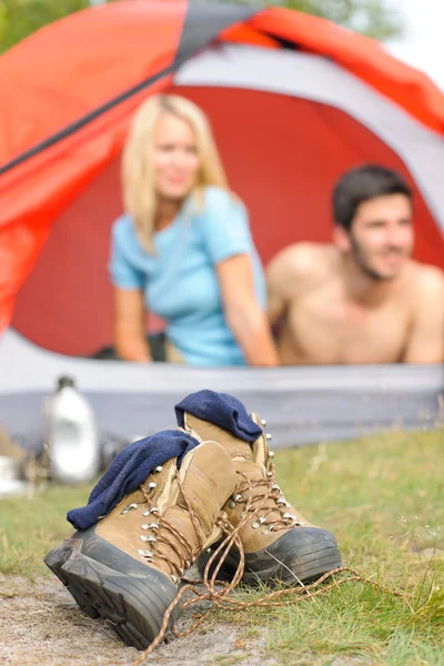 Hiking boots outside tent camping couple — Stock Photo, Image