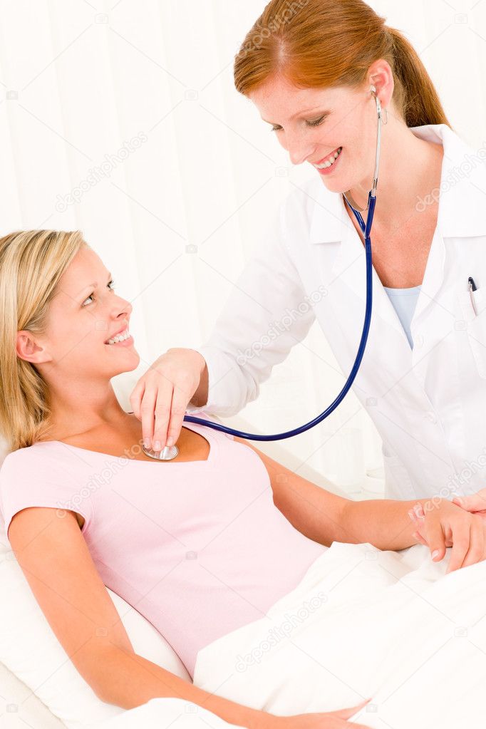 Medical doctor stethoscope examine woman patient
