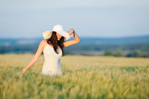 Sunset corn field beautiful brunette woman walk — Stock Photo, Image