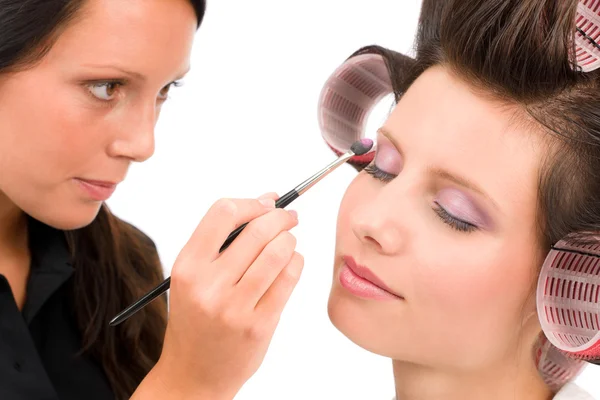 Make-up artist woman fashion model apply eyeshadow Stock Picture