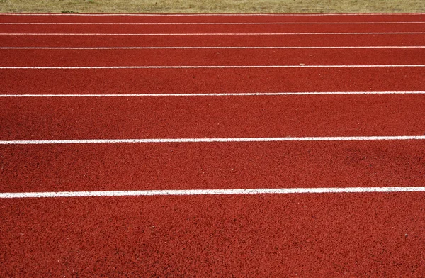 Asphalt for runners placed on local stadium — Stock Photo, Image