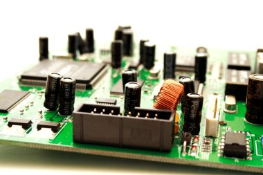 Foto of green computer circuit board transistors clipart