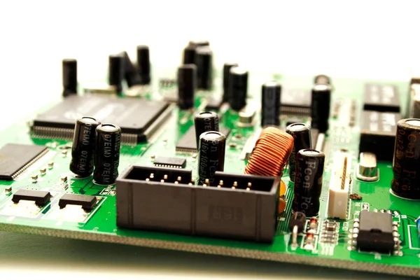stock image Foto of green computer circuit board transistors