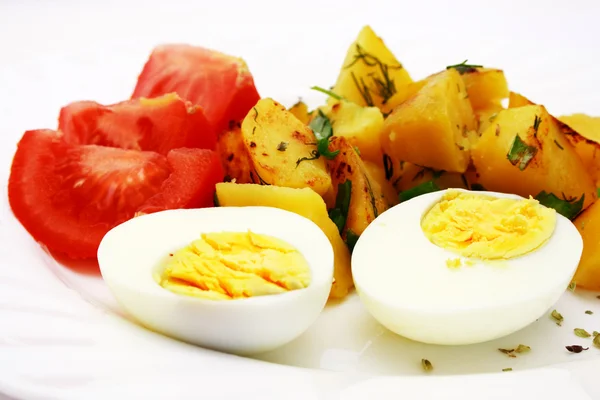 Foto ampliada de tomates, batatas e ovos — Fotografia de Stock