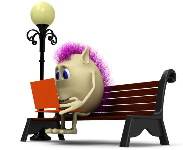 Haired puppet using laptop on brown bench — Stock Photo, Image