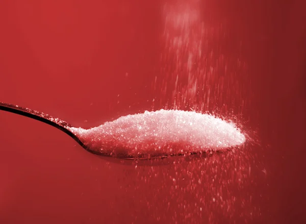 Sugar pouring spoon — Stock Photo, Image
