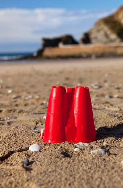 Sandcastle bucket beach sand Cornwall — Stock Photo, Image