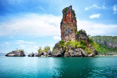 Rocks on Railay beach in Krabi Thailand clipart