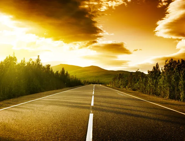 Sunset on the road — Stock Photo, Image