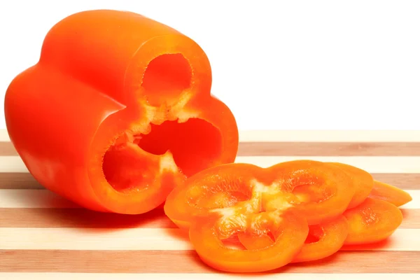 stock image Orange peppers on a white background