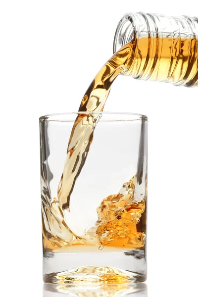 Whiskey being poured into a glass — Stock Photo, Image