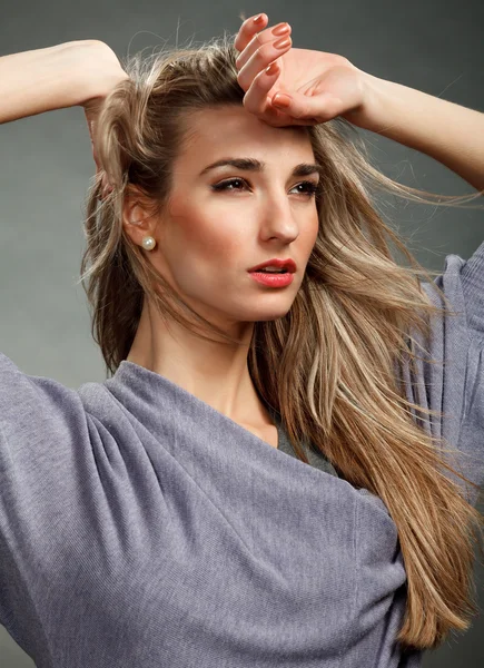 stock image Portrait of a beautiful girl with flying blond hair