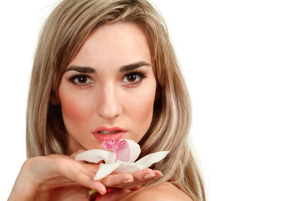 Beautiful blond girl with orchid flower isolated on white backgr — Stock Photo, Image