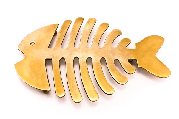 Brass fish mat - kitchen utensil — Stock Photo, Image