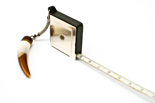 Pequeña cinta métrica metálica como colgante —  Fotos de Stock