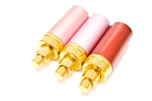 Três latas de spray horizontais coloridas — Fotografia de Stock