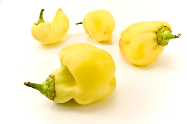 Deformed yellow paprika peppers — Stock Photo, Image
