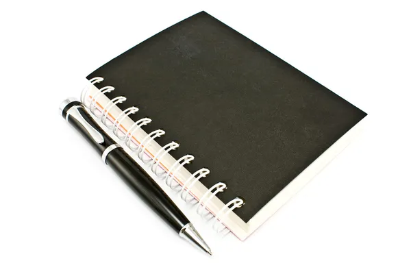 Pen en spiraal notebook — Stockfoto