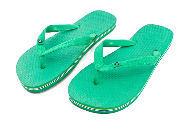 Dvojice zelené gumové pantofle sandále — Stockfoto