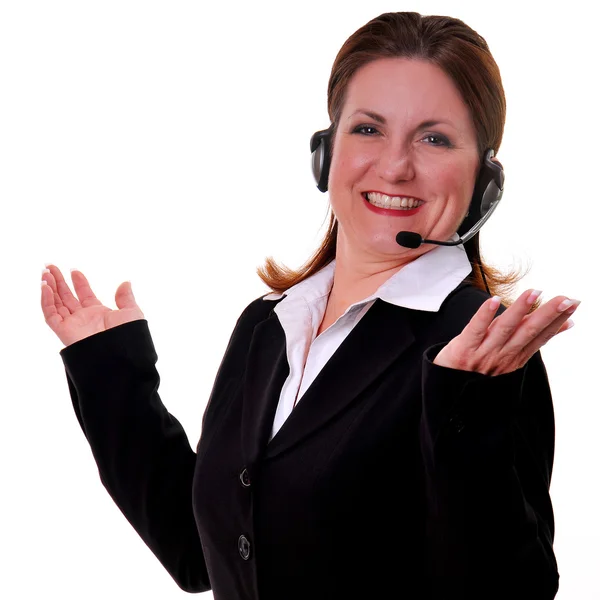 Fejhallgatós mikrofont viselő szép nő Stock Kép