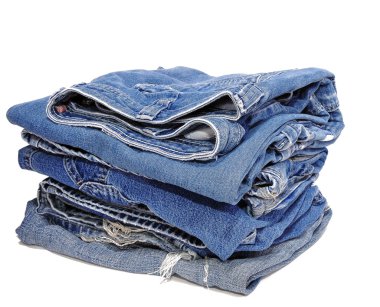 Blue Jeans folded in a neat stack clipart