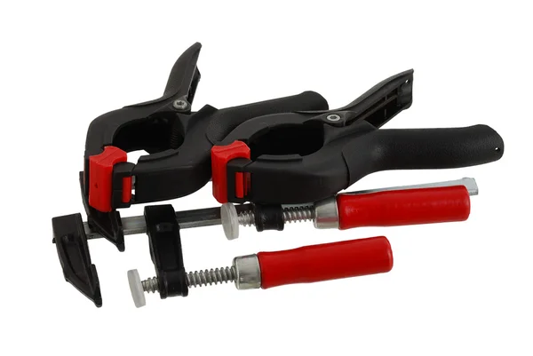 Two pairs of different clamps — Stock Photo, Image