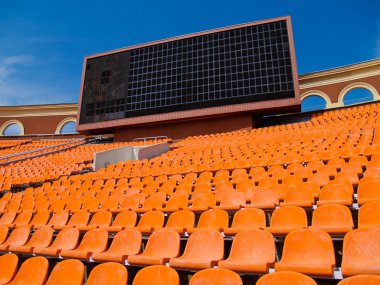 Row of seats and score board clipart