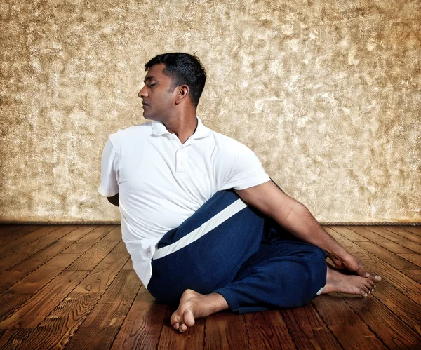 Yoga ardha matsiendrasana twist pose — Stock Photo, Image