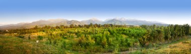 Panorama of Zaili Alatau mountains in Kazakhstan clipart