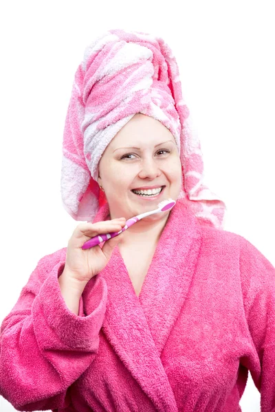 Woman in pink with tooth brush Stock Image
