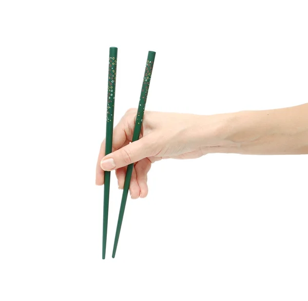Chineese sticks in hand — Stock Photo, Image
