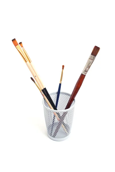 Glass with brushes — Stock Photo, Image