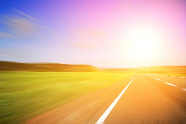 stock image Blurred road and sky