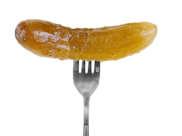 Marinated cornichon on the fork isolated on the white background — Stock Photo, Image