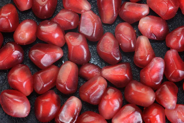 Pomergranate berry als voedsel achtergrond — Stockfoto