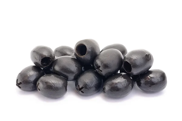Some black pitted olives isolated on the white background — Stock Photo, Image