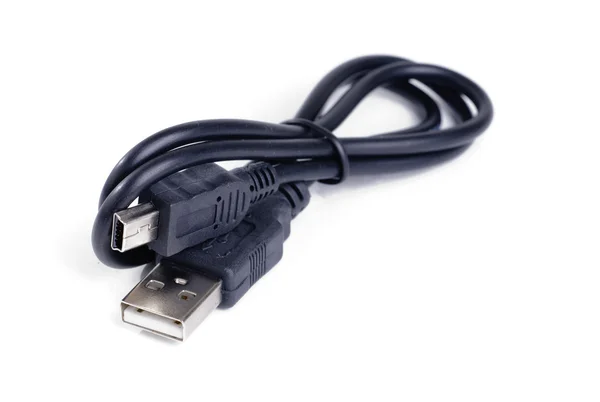 Black computer usb cables on white background — Stock Photo, Image