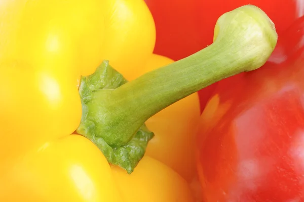 Gelber und roter Pfeffer als Lebensmittelhintergrund — Stockfoto