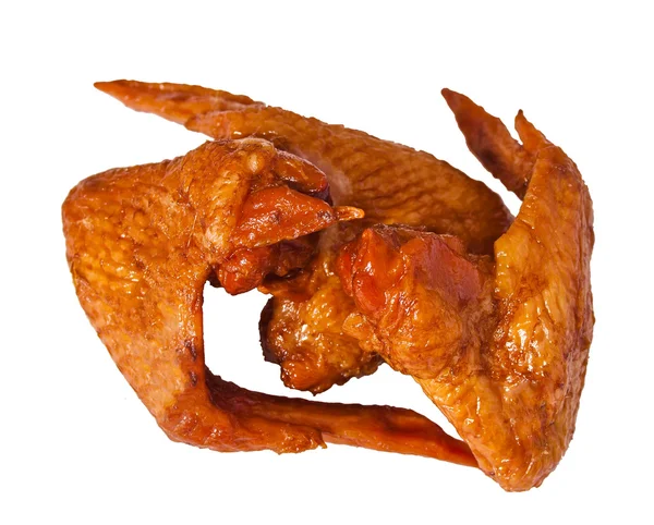 Pyszne nadęty kurczaka skrzydła na biały — Zdjęcie stockowe