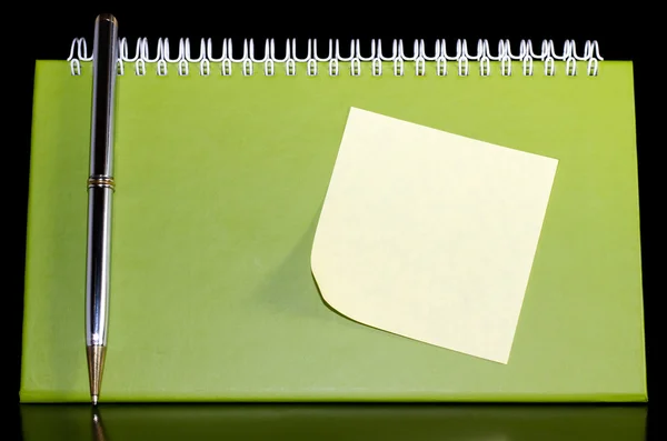 Organizer with pen and noteped