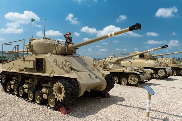 Stock image Boy on tank.